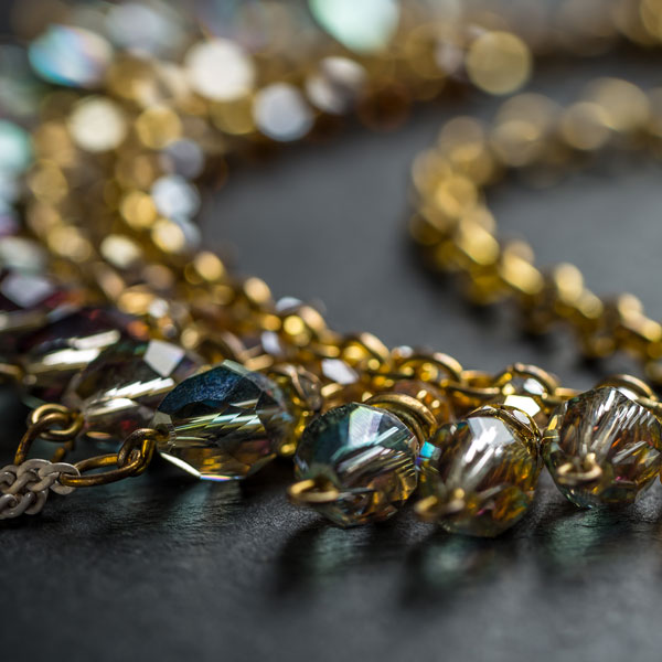 Gold Jewellery with green diamond